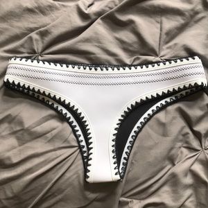 White and black bathing suit bottoms